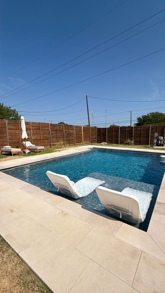 Full backyard pool and outdoor living view — LiquidLux Custom Pools